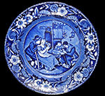 Pearlware London-shape cup and saucer reverse printed in dark blue. Printed mark on reverse of saucer with Christmas Eve (pattern name) and manufacturer (Clews). 4” cup rim diameter; 2.5” cup height; 5.75” saucer rim diameter; 1” saucer height. Note impressed asterisk mark in center of printed mark. Also impressed maker’s mark for James and Ralph Clews (1814-1834), Cobridge.